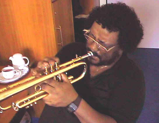 Ted Murdock, with coffee and trumpet